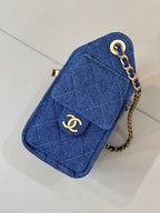 Chanel blue denim clutch with gold CC logo, chain strap and snap clasp