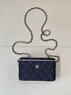 Chanel mini quilted shoulder bag in dark blue with chain strap and top zip