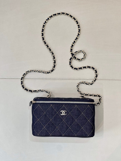 Chanel mini quilted shoulder bag in dark blue with chain strap and top zip