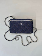 Chanel mini quilted shoulder bag in dark blue with chain strap and zipper closure