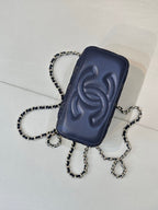 Chanel dark blue embossed pouch with chain strap and top zipper