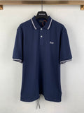 Navy Prada polo shirt with white-striped collar and short sleeves