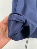 Navy polo shirt sleeve seam and knit collar edge