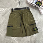 Olive cargo shorts with drawstring waist and side zipper pocket with Stone Island patch