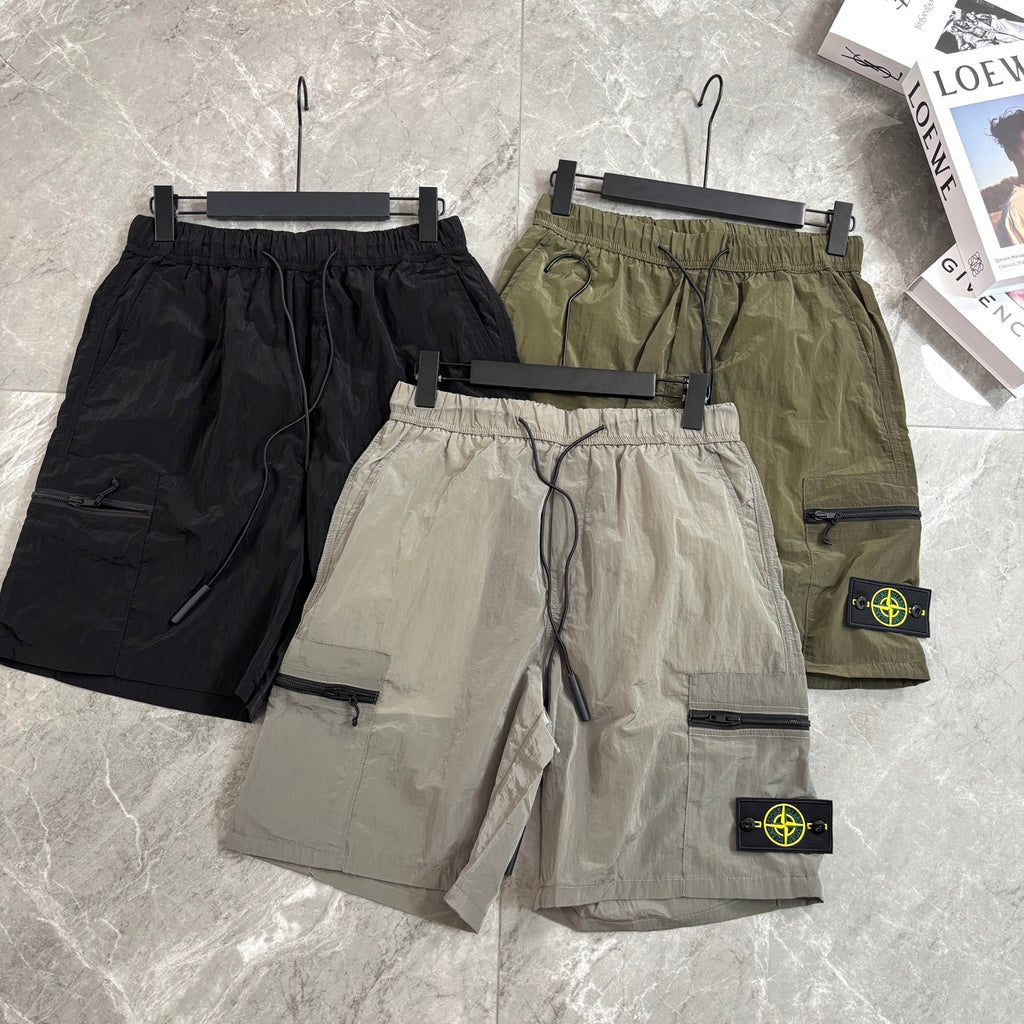 Four cargo shorts with Stone Island patches in black, olive, and beige shades