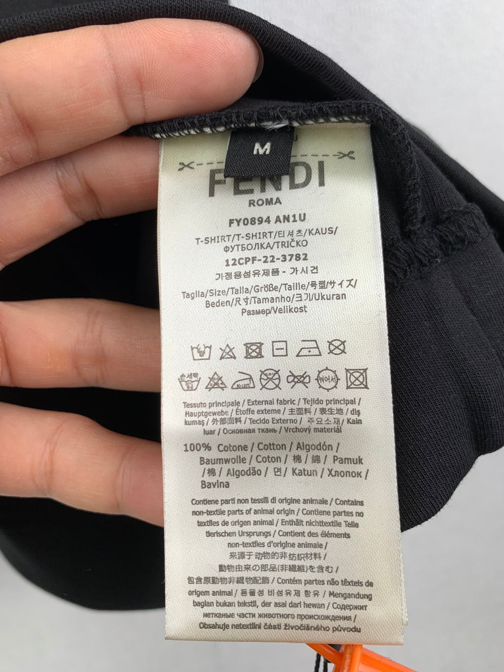 Black Fendi shorts fabric label detail, size M