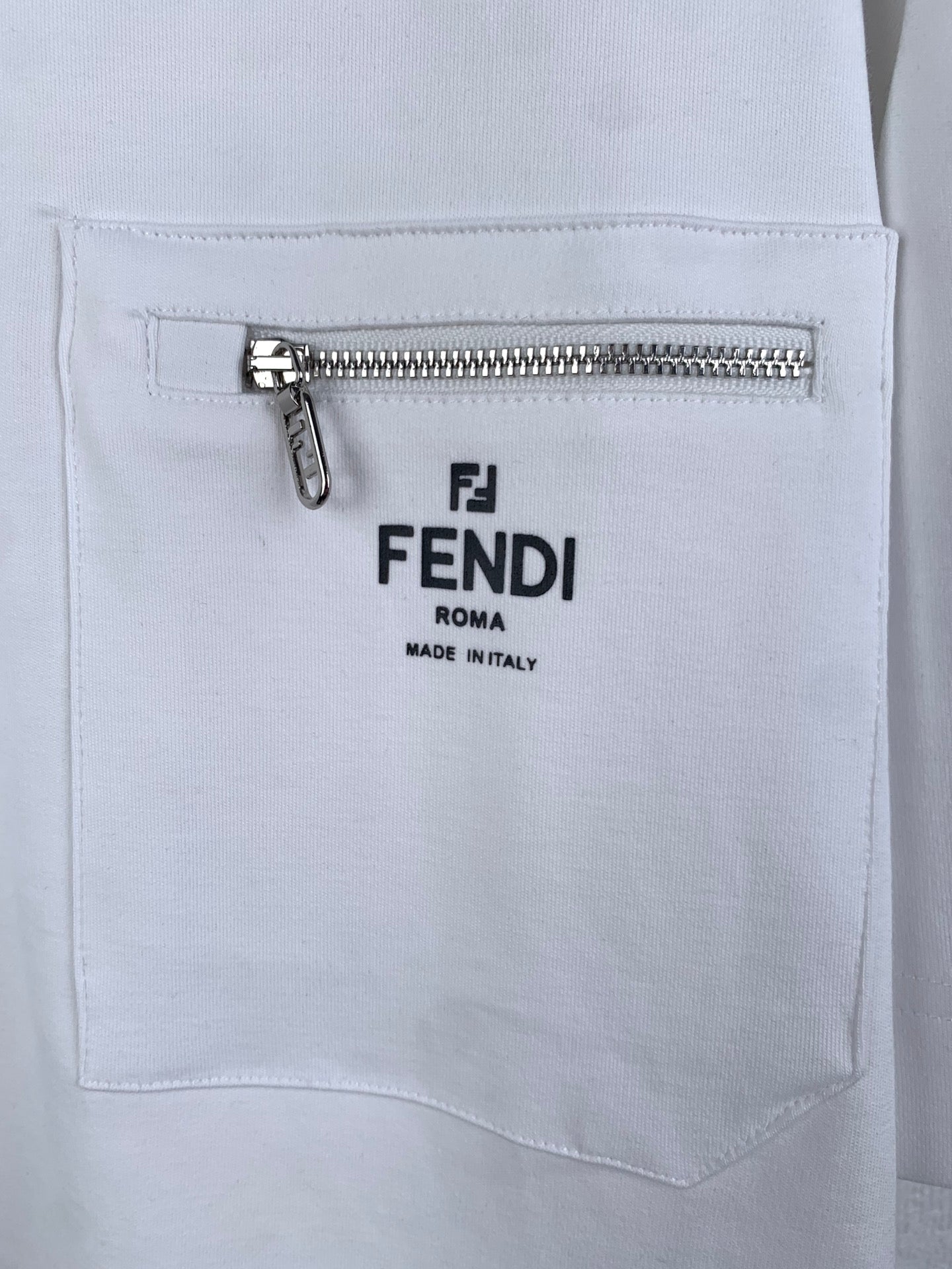 White Fendi T-shirt chest pocket with FENDI Roma and Made in Italy text