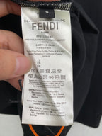 Fendi shorts care label on dark fabric