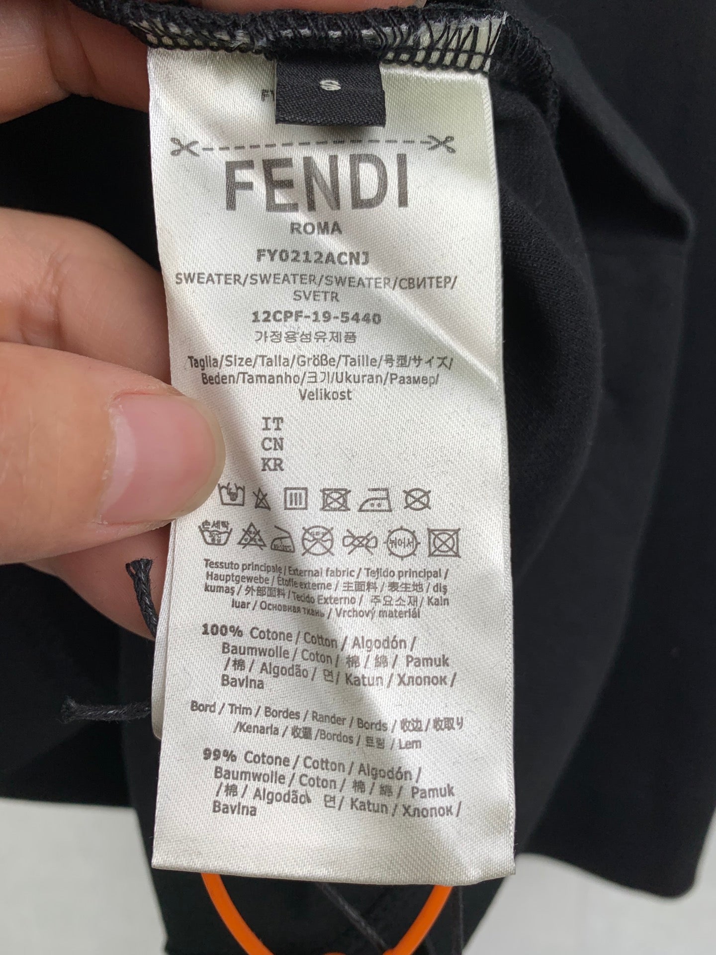 Fendi shorts care label on dark fabric