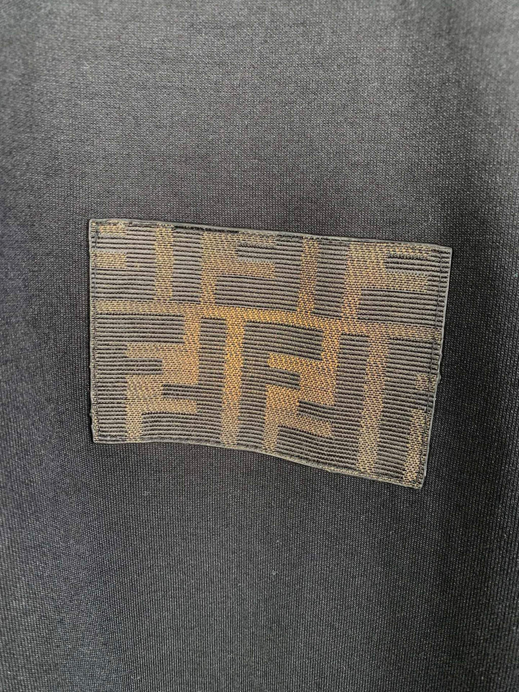 Square Fendi logo patch on black short-sleeve T-shirt