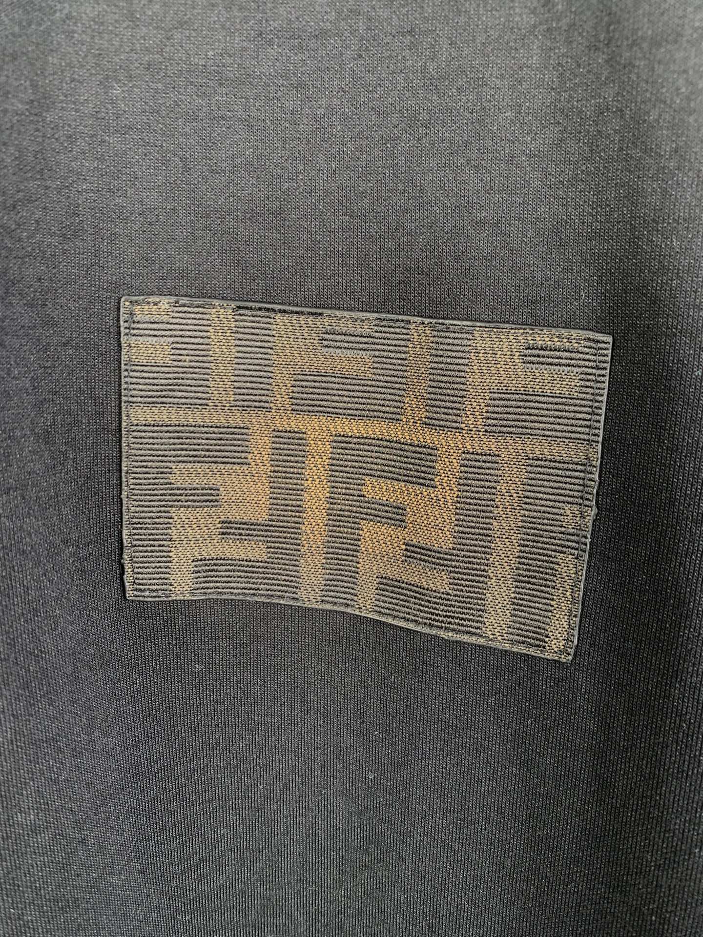 Square Fendi logo patch on black short-sleeve T-shirt