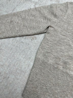 Heather gray long-sleeve sweater with ribbed knit hem and fold detail