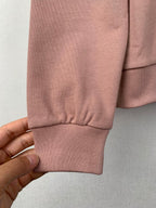 Mauve pink sweatshirt ribbed sleeve cuff with elastic hem