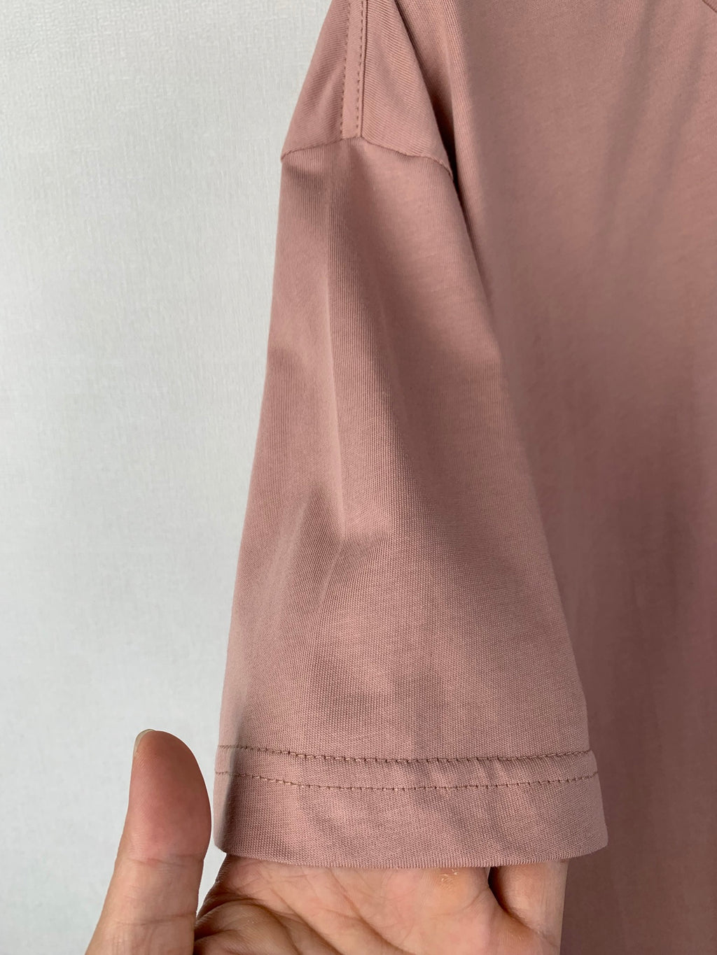 Dusty pink T-shirt sleeve with stitched cuff and seam detail
