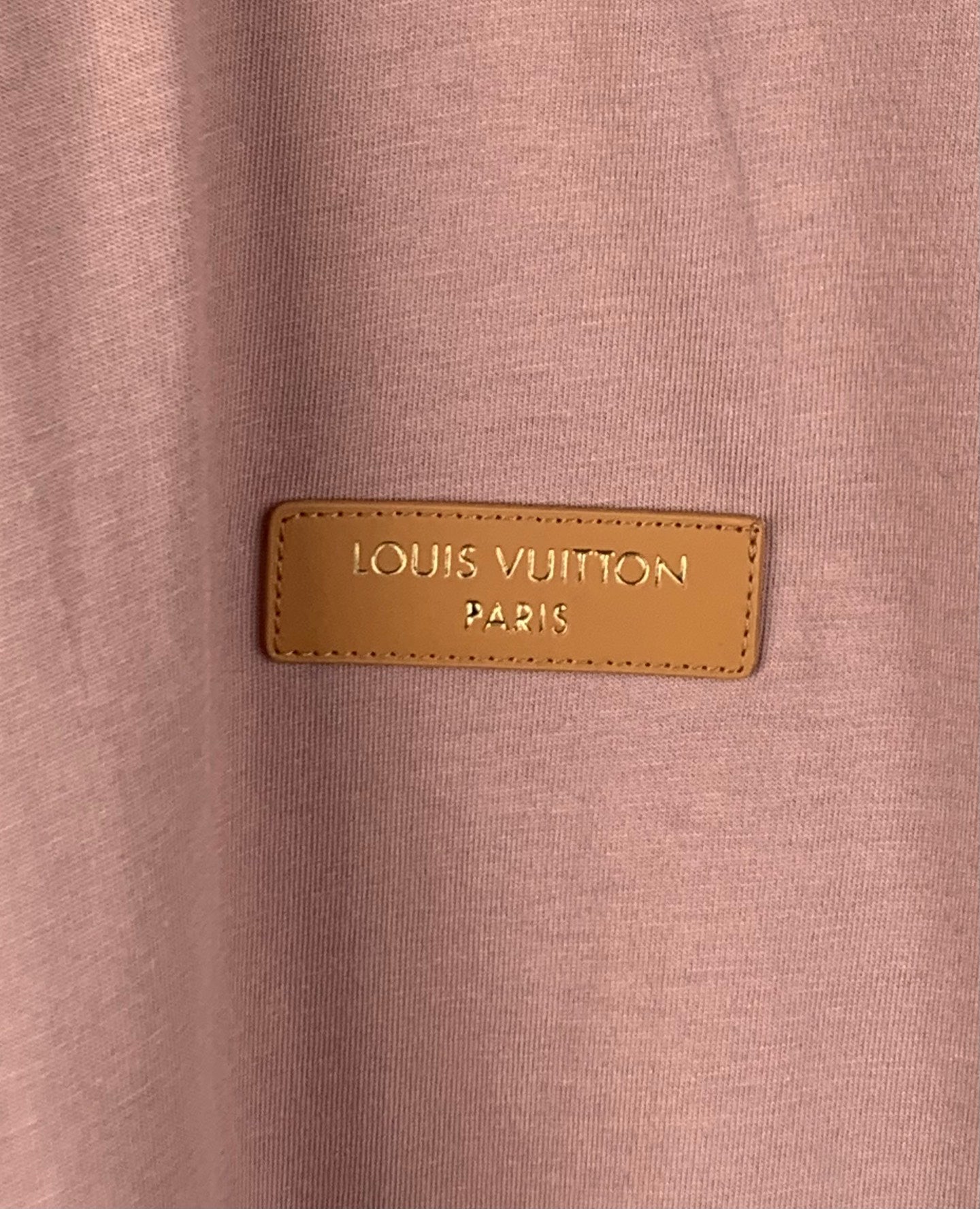 Louis Vuitton Paris logo leather patch on dusty pink T-shirt chest