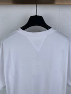 Off white crew-neck T-shirt upper back close-up