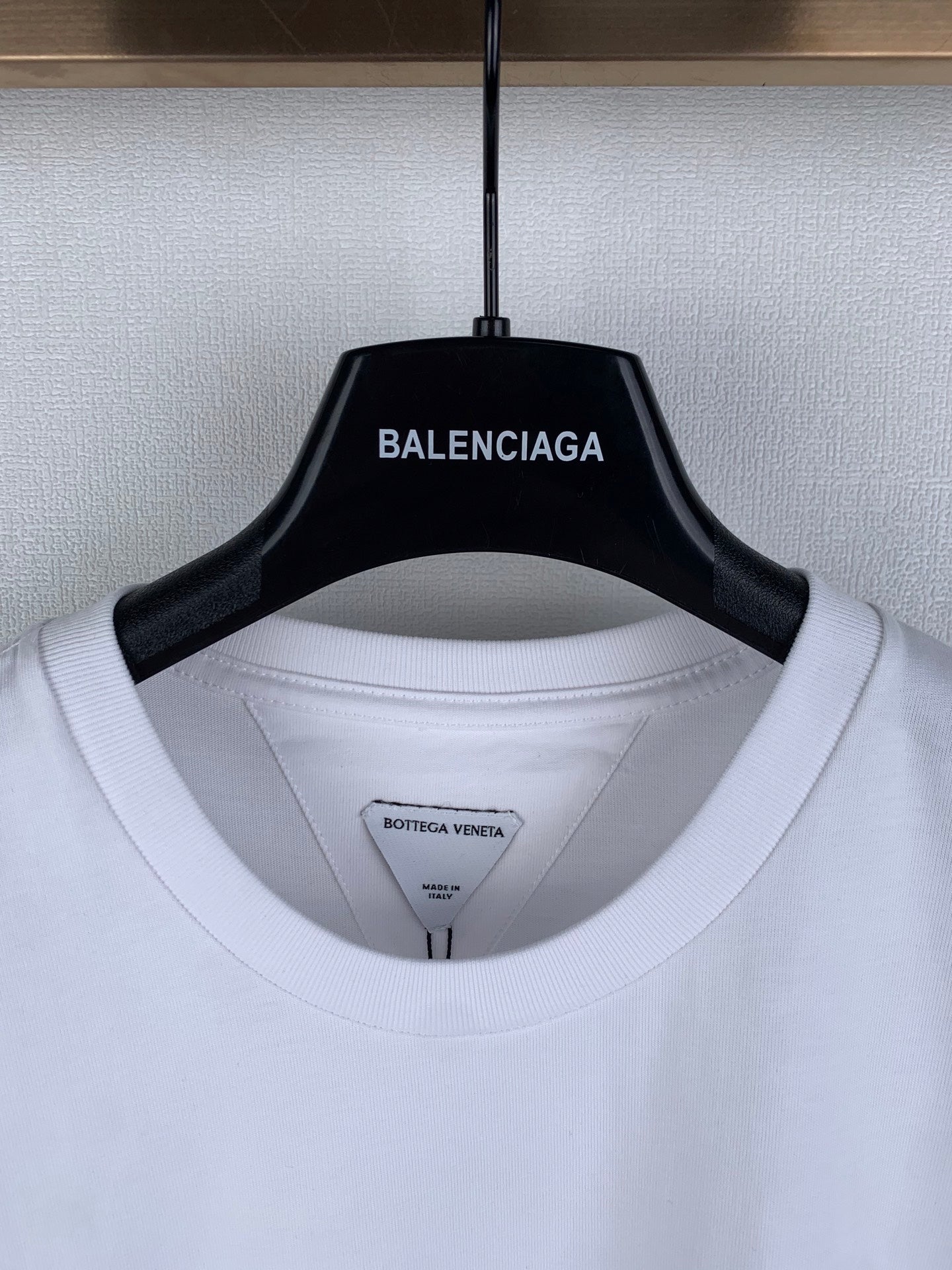 Off white crew-neck T-shirt collar with interior brand label