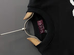 Black Gucci crewneck sweatshirt neckline with hanging metal hook and neck label