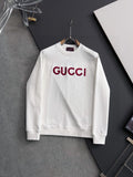 White Gucci long-sleeve sweatshirt with red GUCCI logo at chest