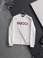 White Gucci long-sleeve sweatshirt with red GUCCI logo at chest