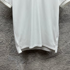 Gucci short-sleeve polo shirt hem, white with straight bottom edge.
