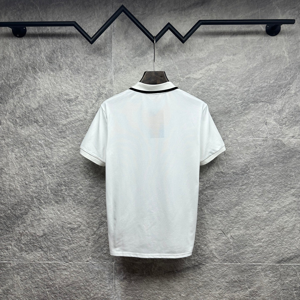 Gucci short-sleeve polo shirt, white back view with black-trim collar.