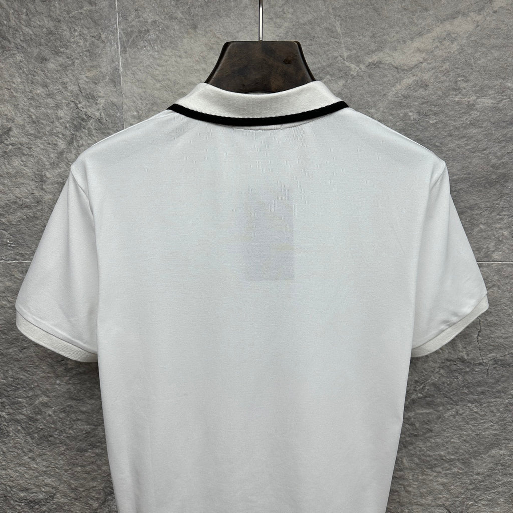 Gucci short-sleeve polo shirt, white back with black-trim collar.