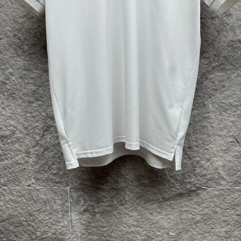 Burberry white polo shirt hem with side vent stitching