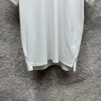 Burberry white polo shirt hem with side vent stitching