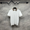 Burberry white polo shirt with checkered plaid collar and button placket