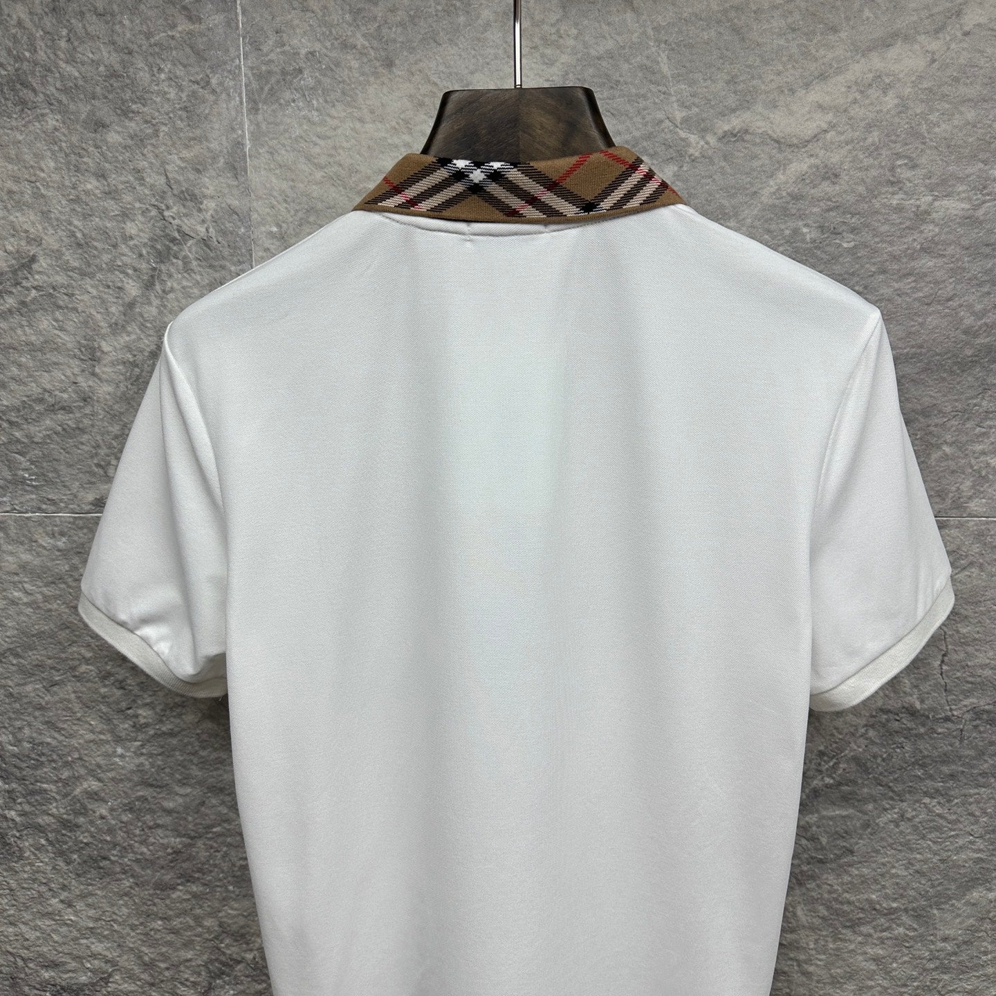 Burberry white polo shirt, back view with checkered collar
