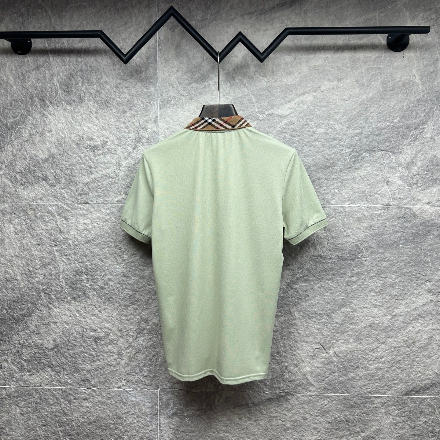 Mint green polo shirt back view with check-trim collar