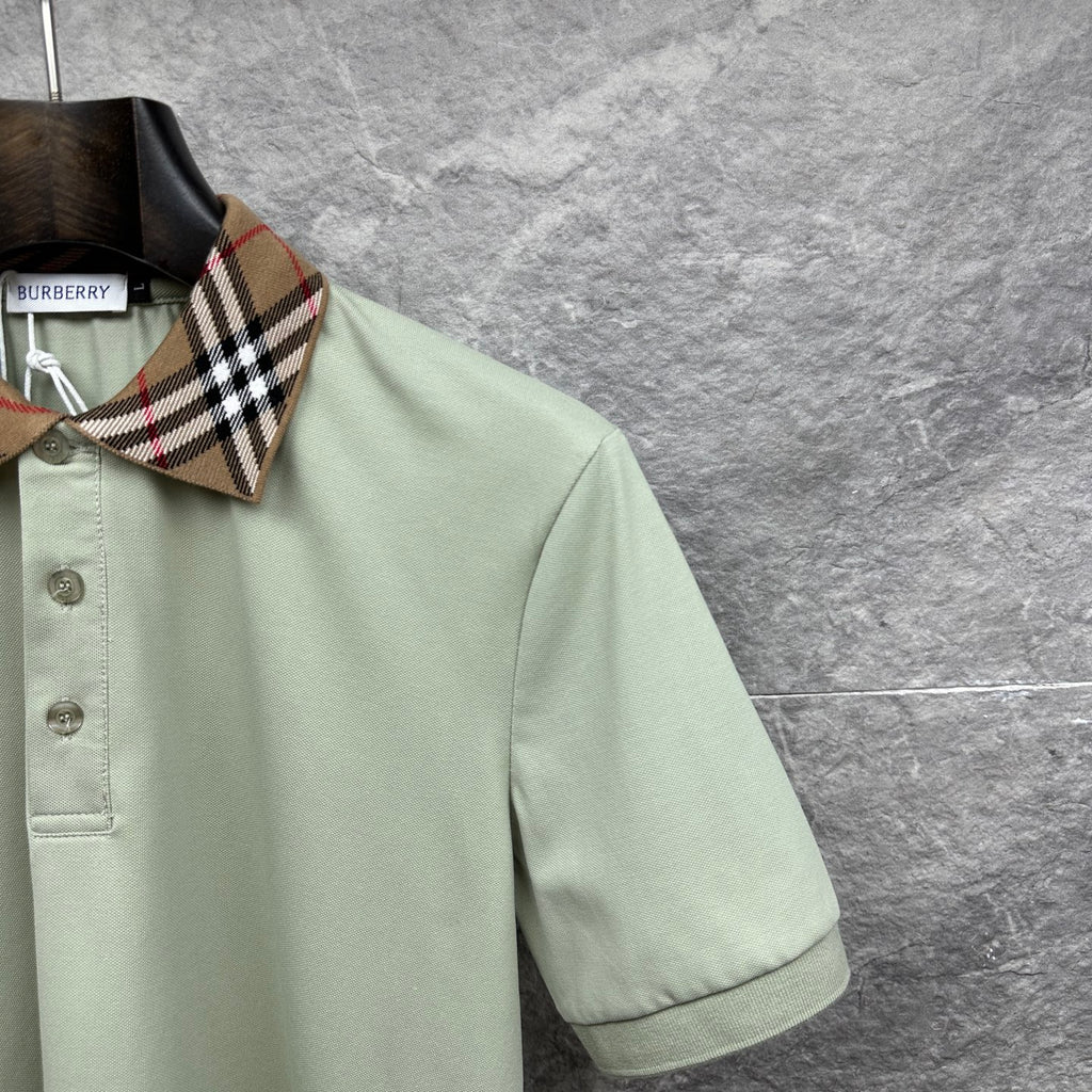 Mint green polo shirt sleeve with check collar edge and button placket