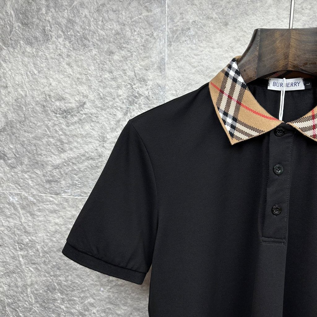 Burberry polo shirt close-up, black with tartan check collar and button placket