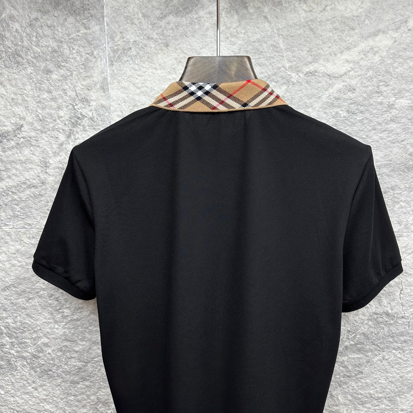 Men's Burberry polo shirt, black back view with tartan check collar