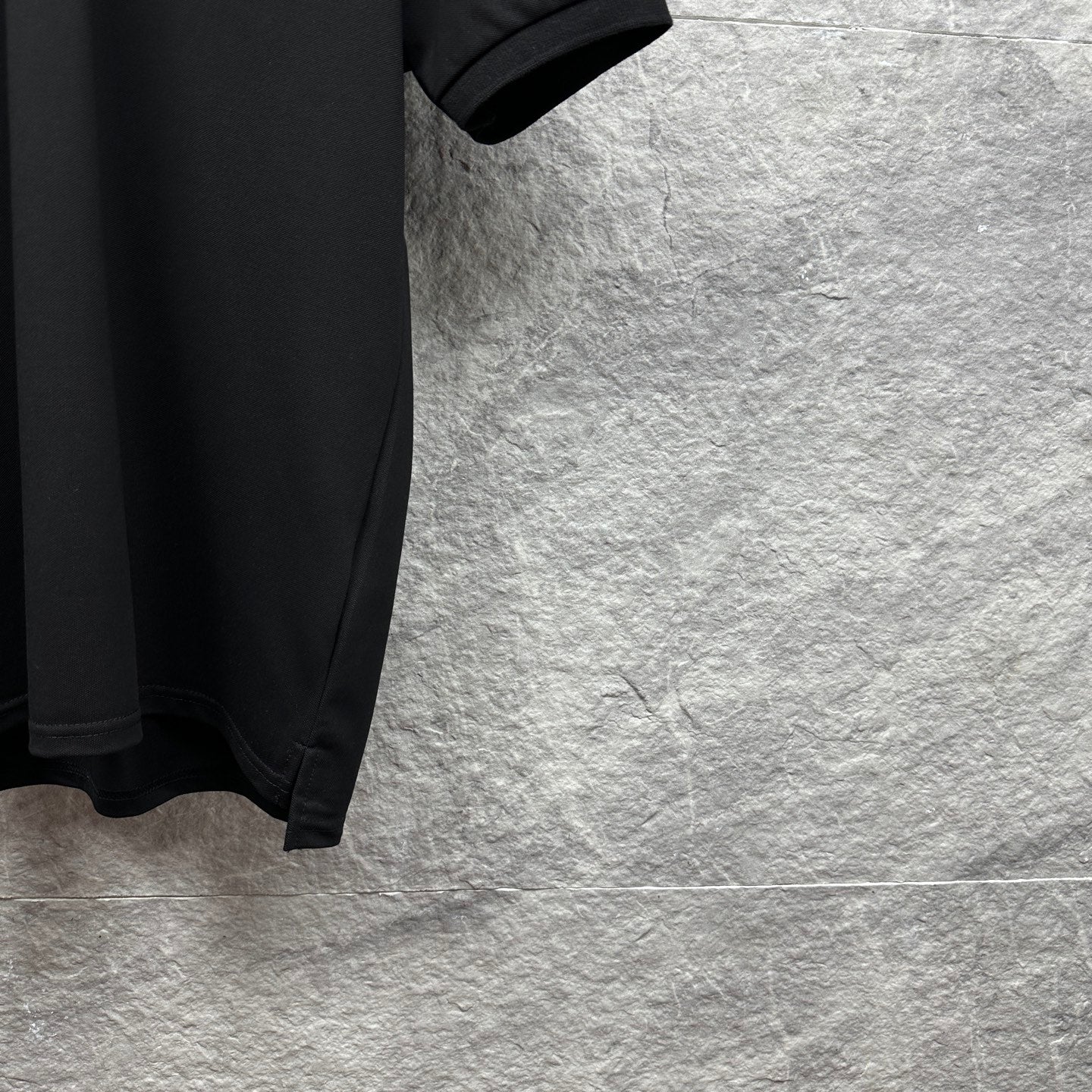 Burberry polo shirt sleeve and side, black