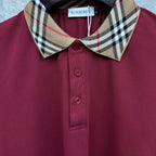 Maroon polo shirt close-up: check collar, Burberry label, and button placket.