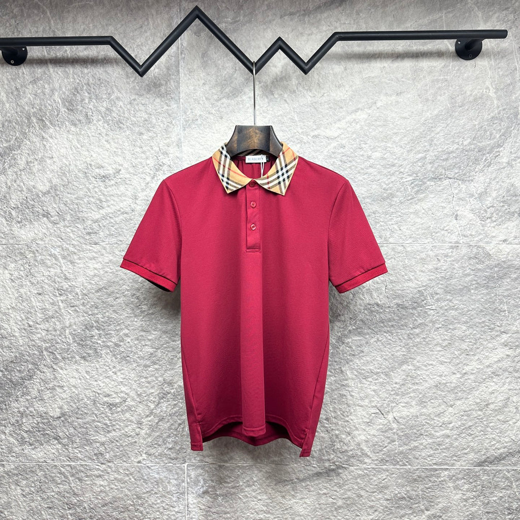 Maroon short-sleeve polo shirt with Burberry check collar and button placket.