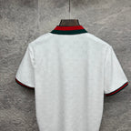 Gucci white polo shirt back view with embossed GG pattern and striped trim.