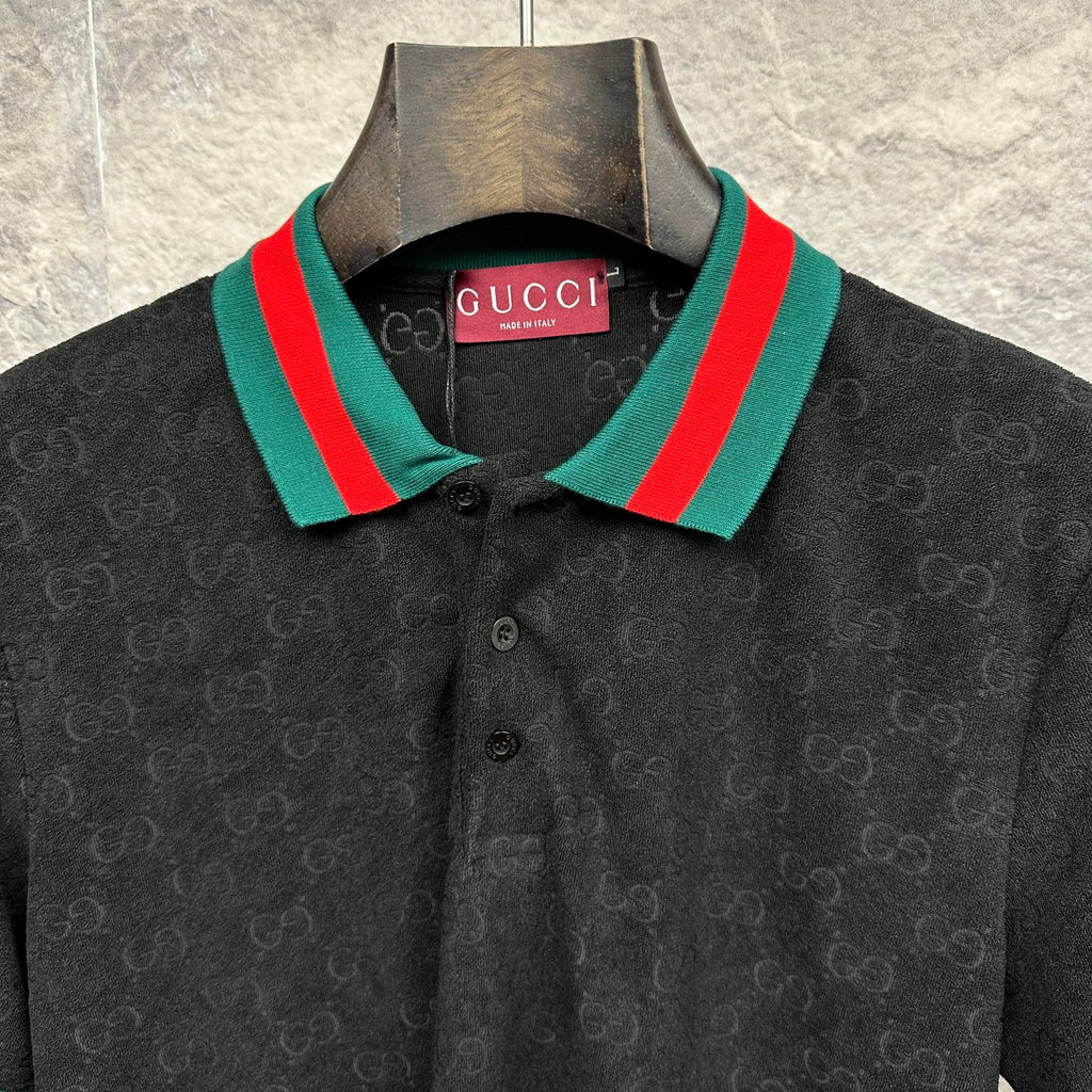 Gucci dark polo shirt close-up of striped collar and GUCCI label