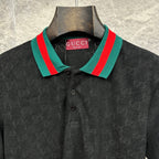 Gucci dark polo shirt close-up of striped collar and GUCCI label