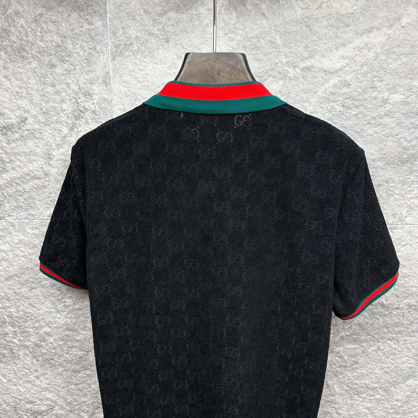Gucci dark polo shirt back view with green-red striped collar edge