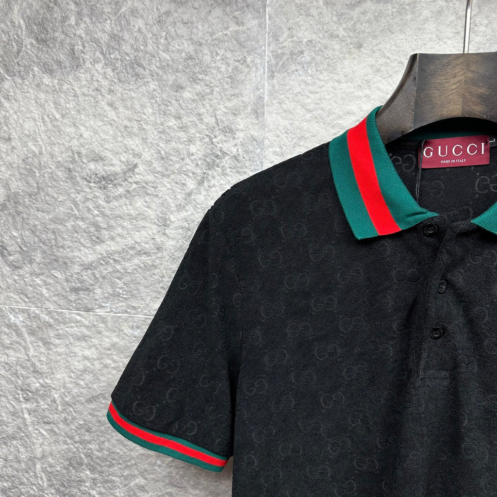 Gucci dark polo shirt close-up of striped collar and dark buttons