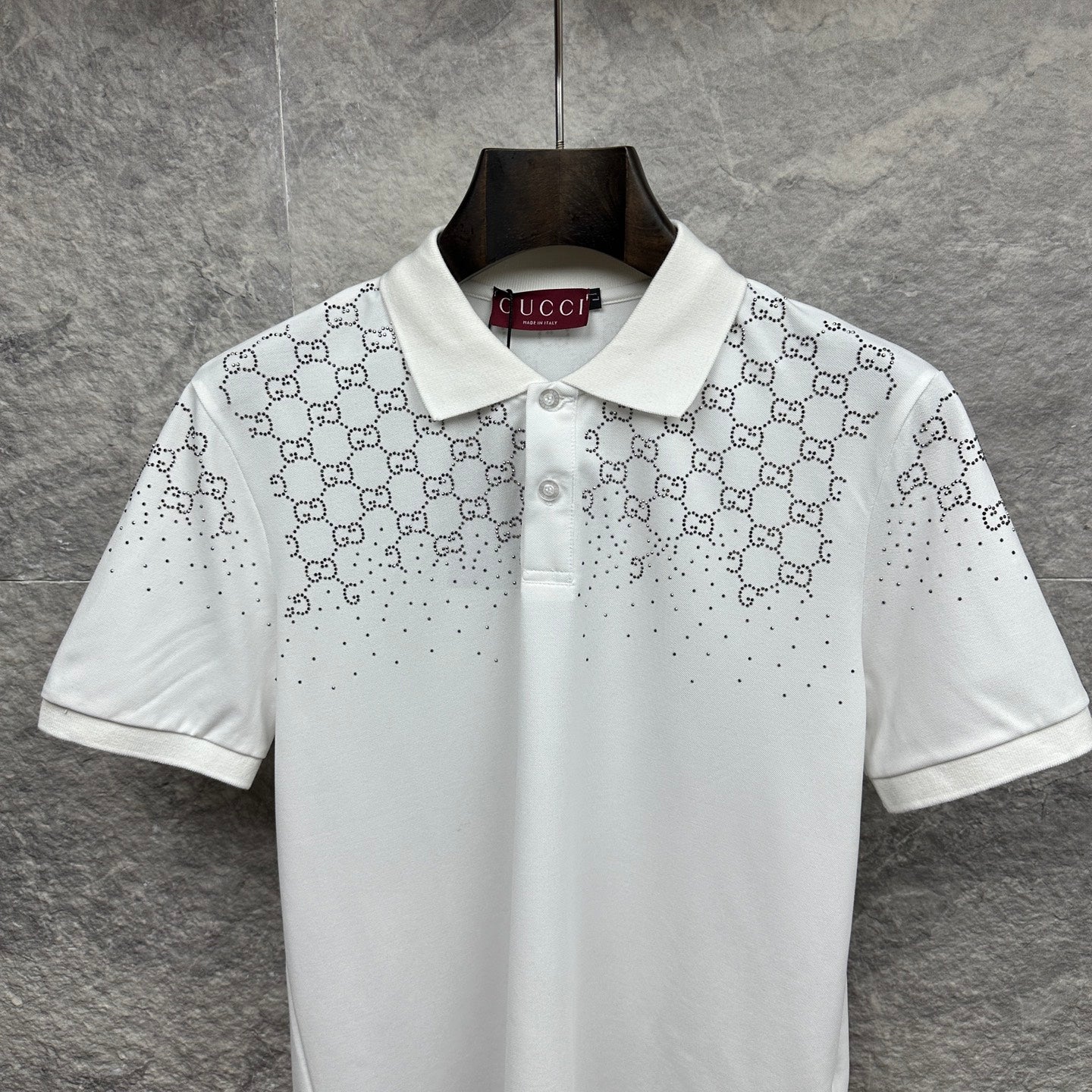Gucci white polo shirt with GG logo print, button placket, and collar