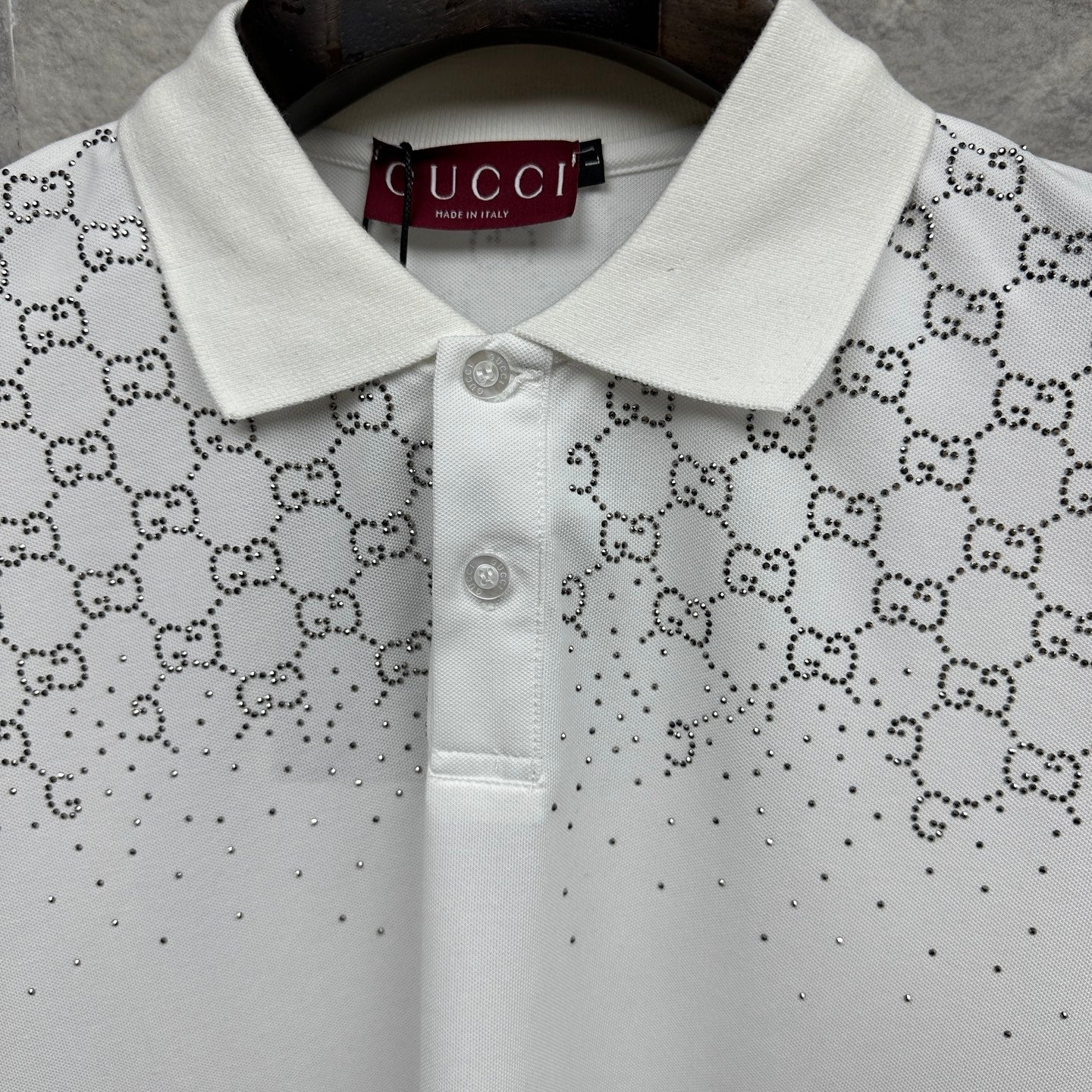 Gucci white polo shirt with GG logo print and buttoned placket