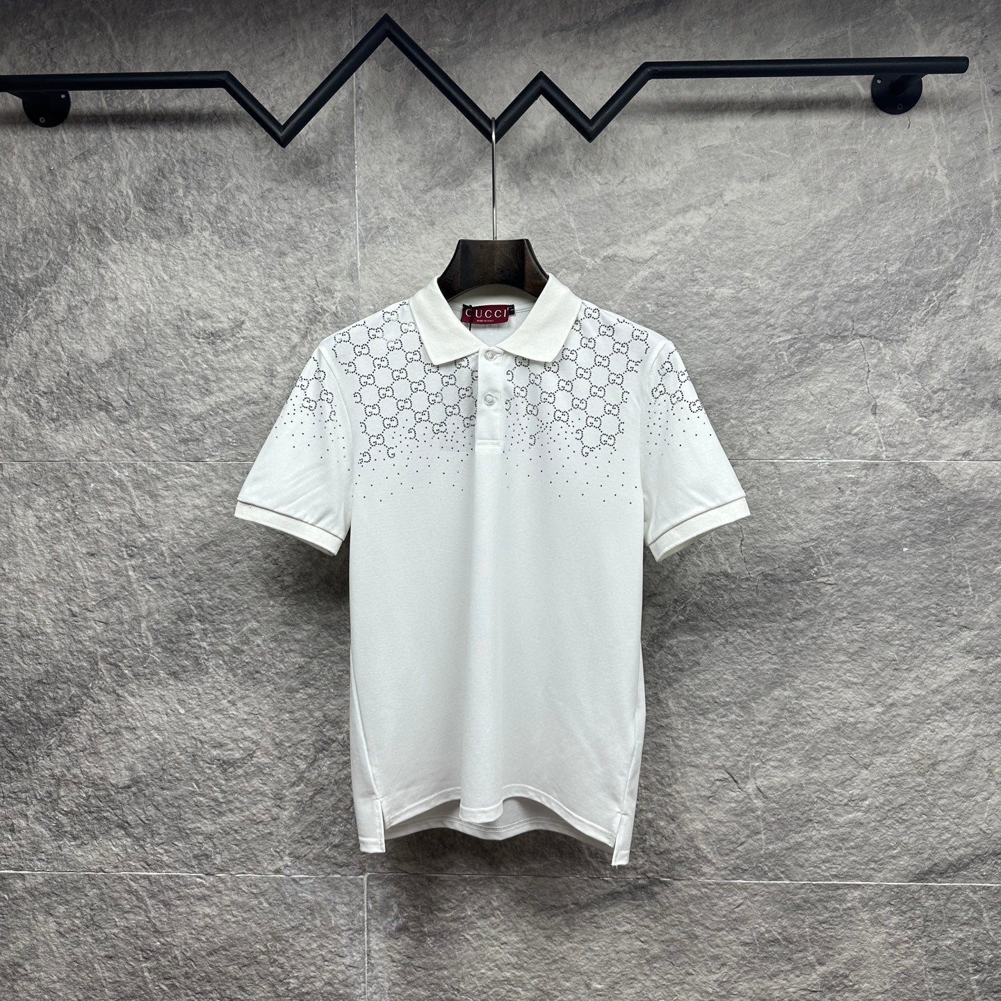 Gucci white polo shirt with GG pattern and rhinestone accents