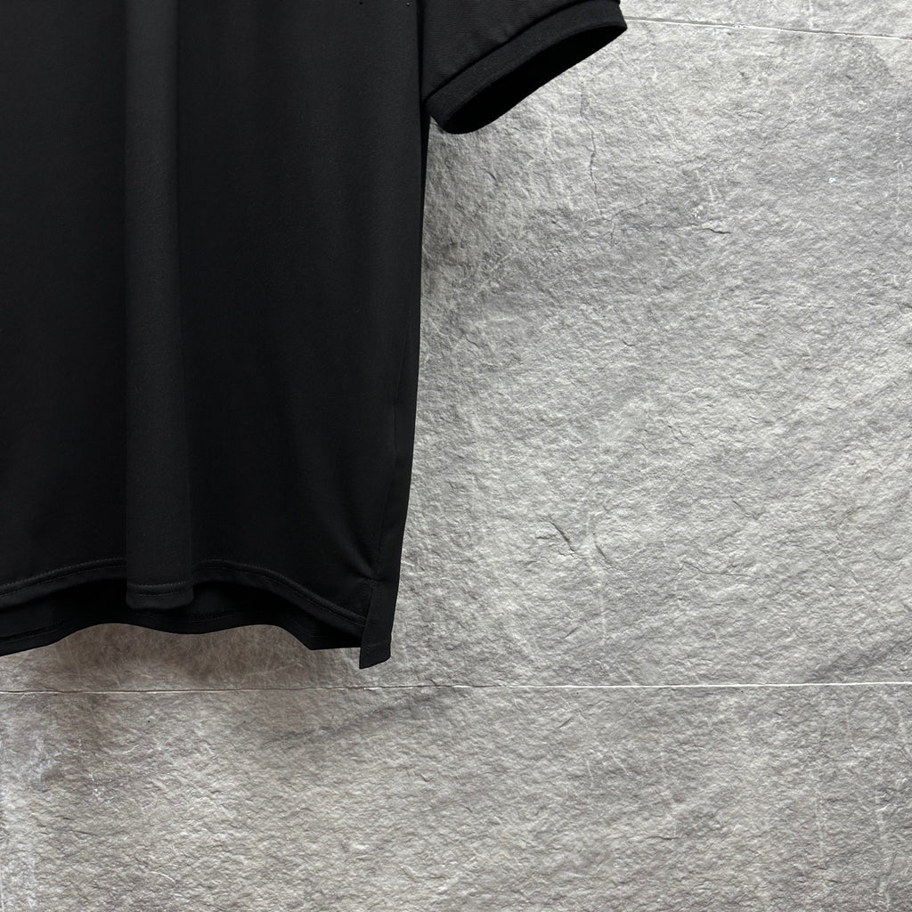 Black Gucci polo shirt side hem with short sleeve cuff
