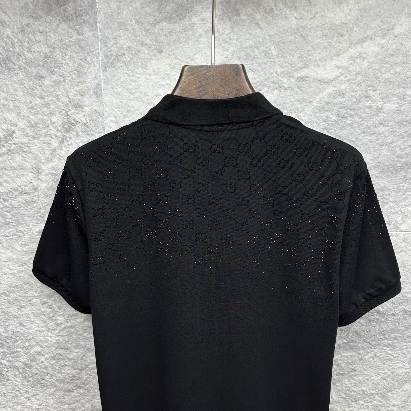 Black Gucci polo shirt back with GG logo pattern