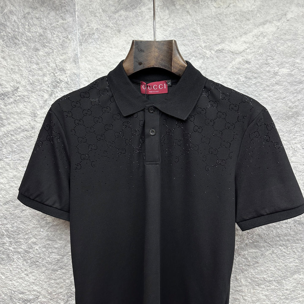 Black Gucci polo shirt with dark buttons and embroidered GG pattern
