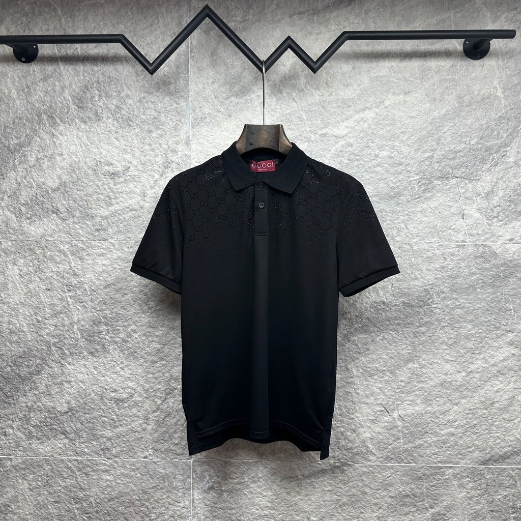 Black Gucci polo shirt with button placket and subtle GG pattern